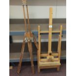 Two folding artists easels