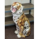 A large pottery growling tiger (repaired paws)