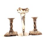 A silver spill vase plus a pair of candlesticks (as found)