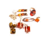 A selection of silver amber set jewellery including necklace, ring,