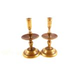 A near pair of (possibly 18th Century) Dutch Heemskerk style small brass candlesticks or