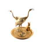 A pair of heavy brass ibises,