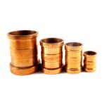 A set of four graduated bronze measures of cylindrical form each inscribed 'Kingston Upon Hull' and