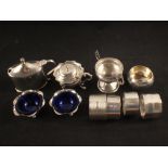 Various silver serviette rings,