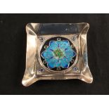 A silver dish with three tone blue and green floral enamel decoration by Joan Ferguson-Gow London