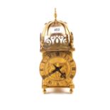 A brass lantern clock