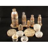 Various pot lids and glass cased Alum sand pictures