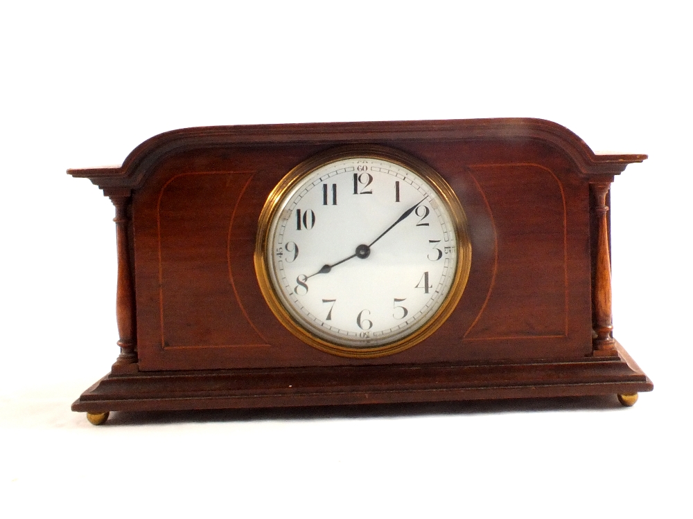 An Edwardian inlaid mahogany mantel clock