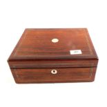 A 19th Century rosewood workbox and contents