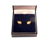 A pair of 18ct gold diamond stud earrings