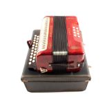 A cased Hohner Erica accordion