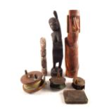 Three tribal wooden figures,