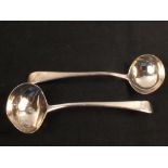 A pair of silver sauce ladles,