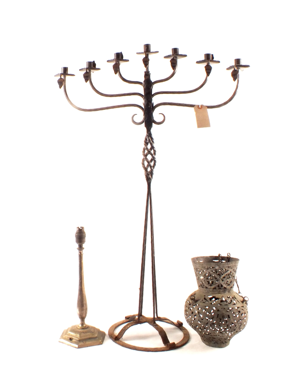 A wrought iron floor candelabra, a hall lantern,