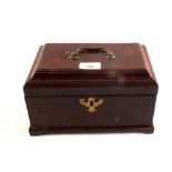 An antique mahogany Chippendale style three division tea caddy with brass handle and escutcheon and