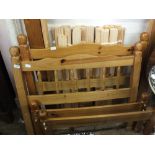 A pair of pine single bed frames