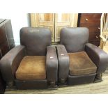 A pair of vintage brown leatherette and wooden framed armchairs