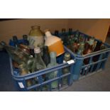 Two Crates of Aqua Glass and Brown Glass Bottles and Stoneware Bottles