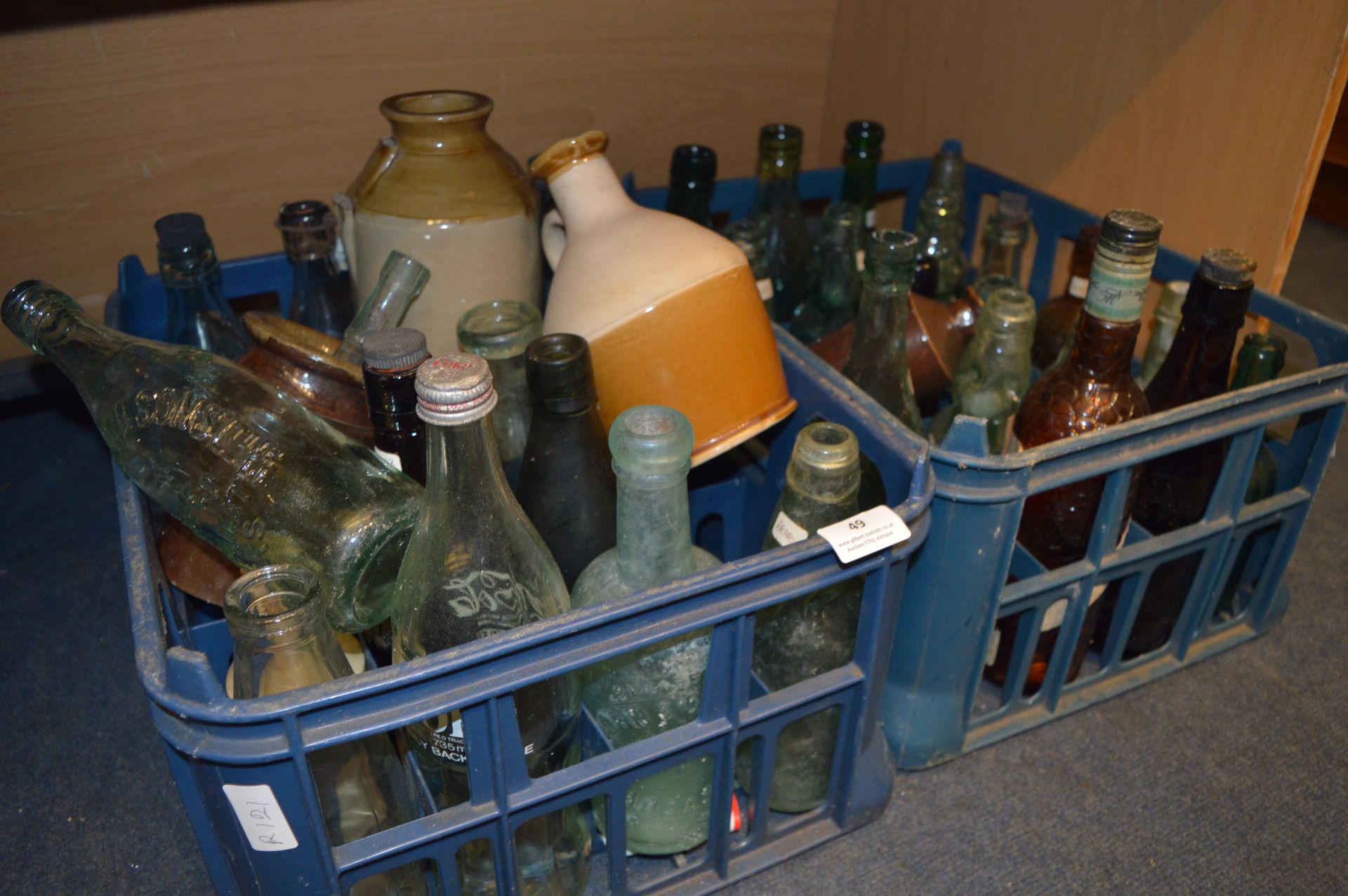 Two Crates of Aqua Glass and Brown Glass Bottles and Stoneware Bottles