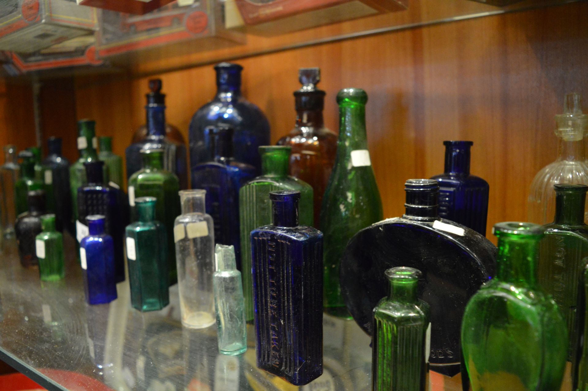 Large Collection Of Blue and Green Glass and Other Poison Bottles