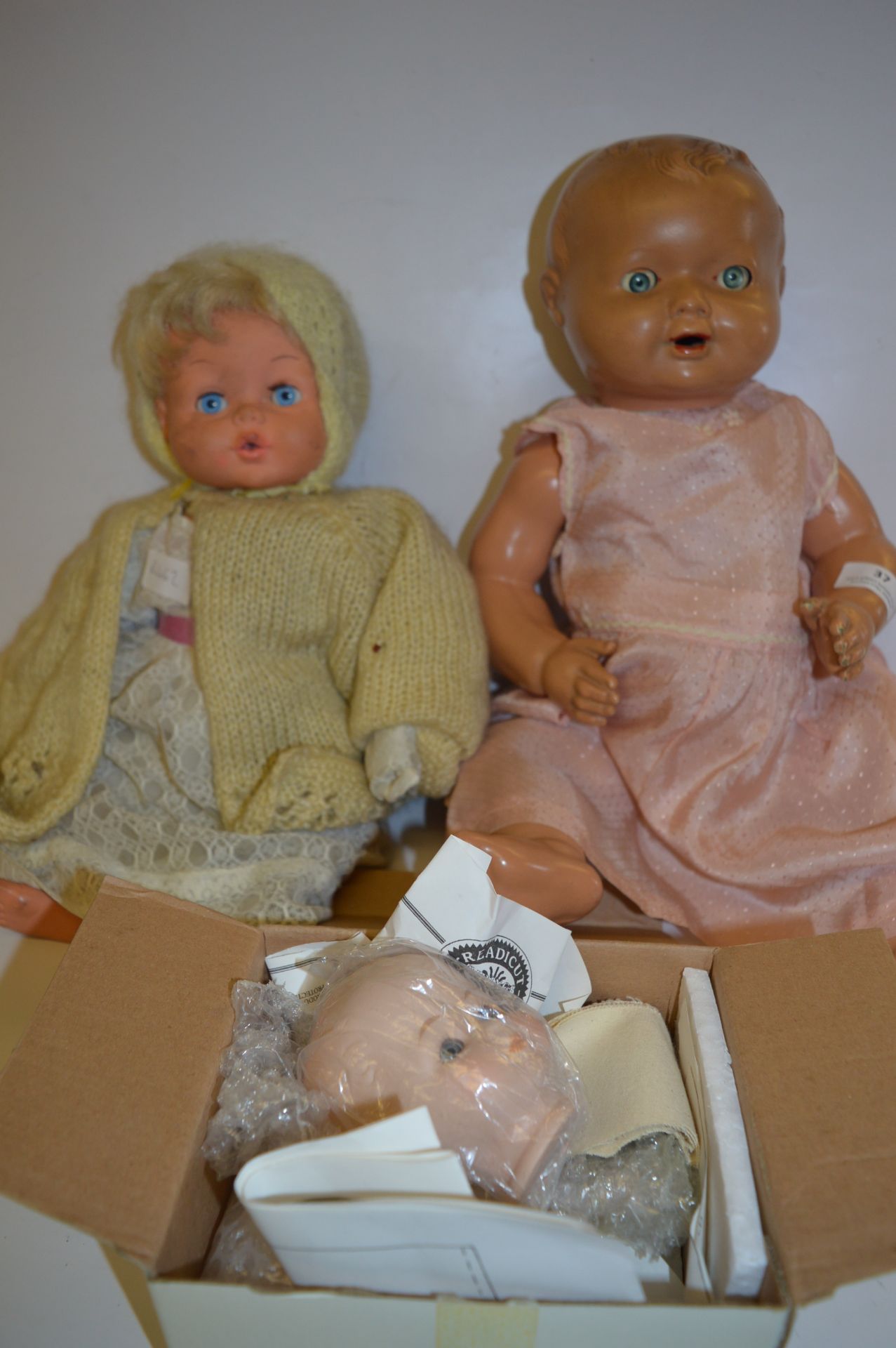 Composition Doll, Plastic Doll and a Pot Doll