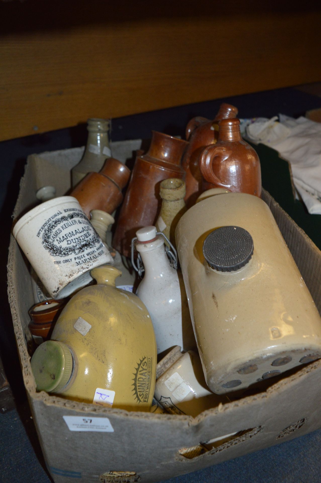 Box Containing a Large Amount of Stoneware Bottles and Foot Warmers