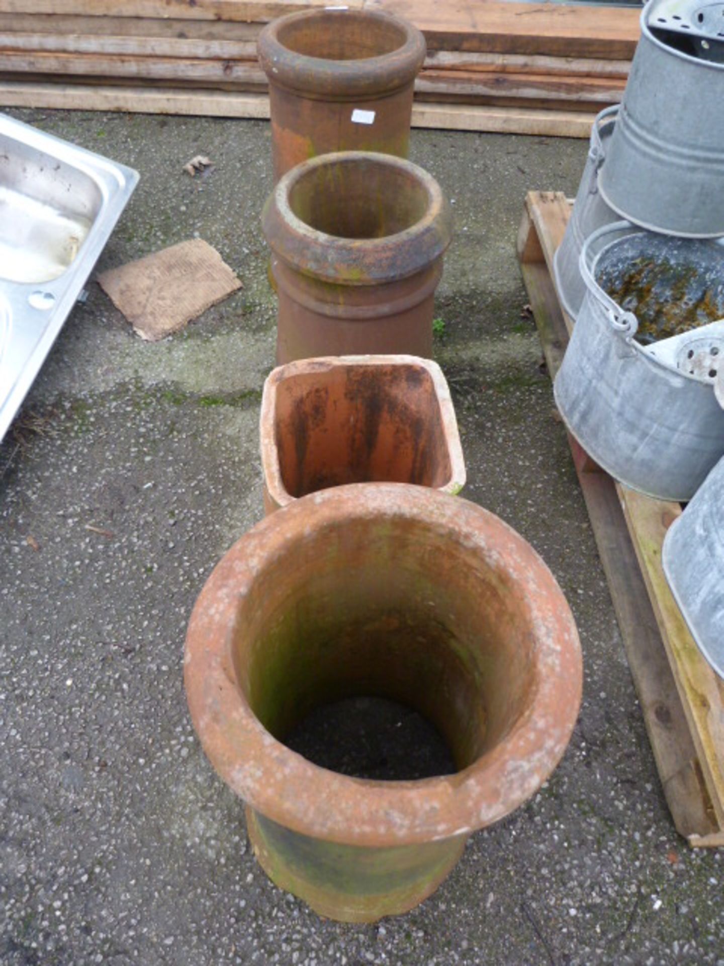 *Four Clay Chimney Pots