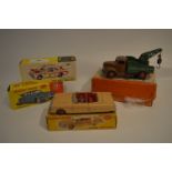 Four Boxed Dinky Vehicles: Breakdown Lorry, Jaguar, Packard Convertible and a Lotus