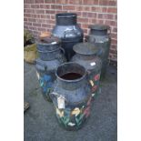 Five Black Painted Milk Churns