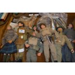Six Action Man Figures With Brutus Action Man Guard Dog and Accessories