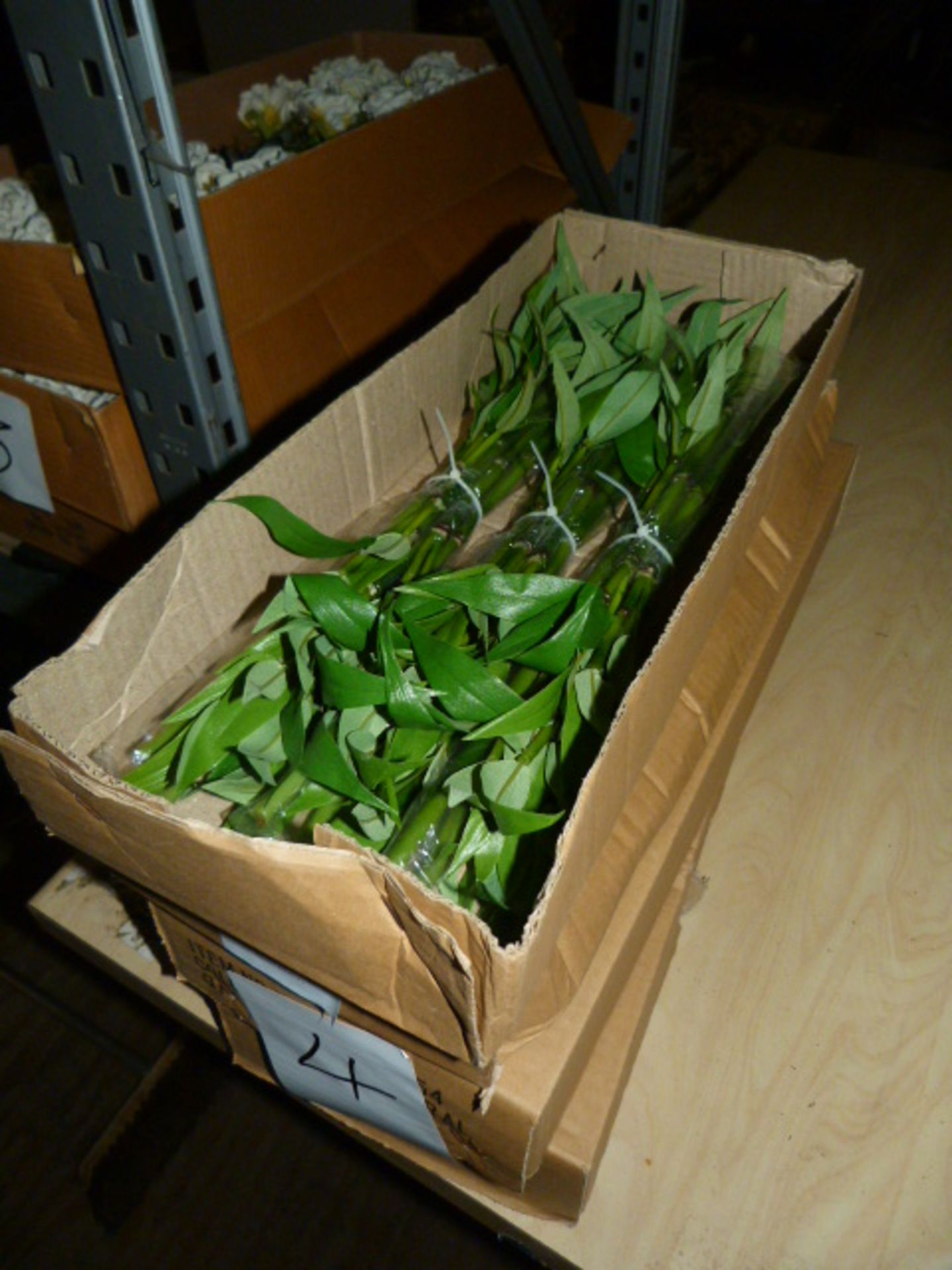 *Four Boxes Containing 3 Dozen Bunches of Artificial Bamboo