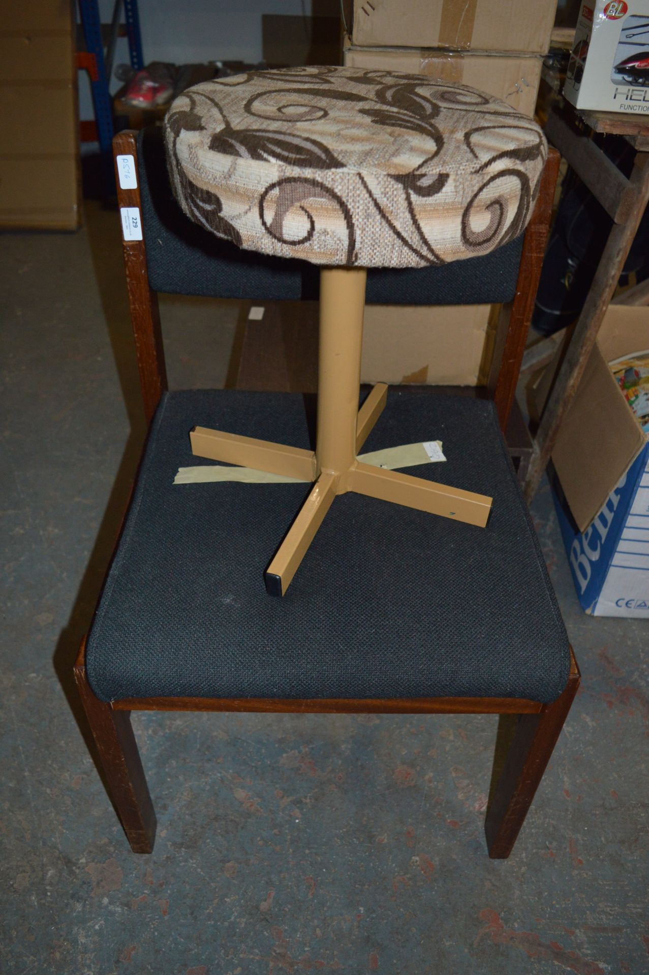 Black Upholstered Office Chair and a Stool
