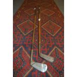 Two Wooden Shaft Golf Clubs