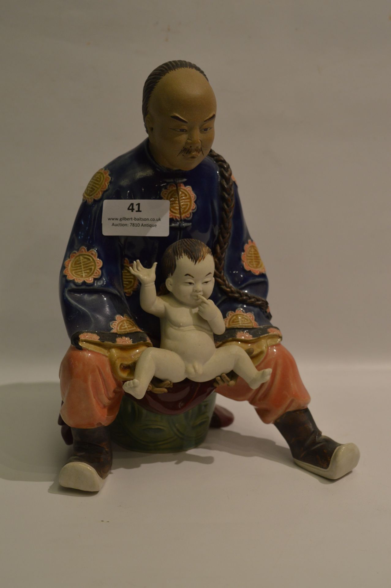 Chinese Pottery Figurine "Man with Child"