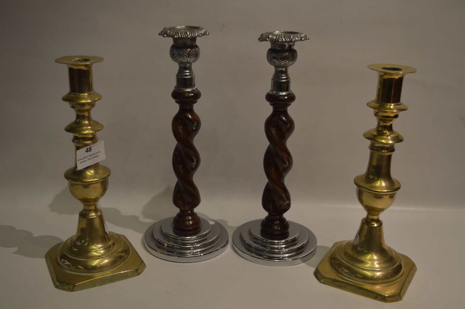 Pair of Brass and a Pair Oak Barley Twist Candlesticks