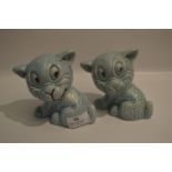 Pair of Blue Pottery Grinning Dogs