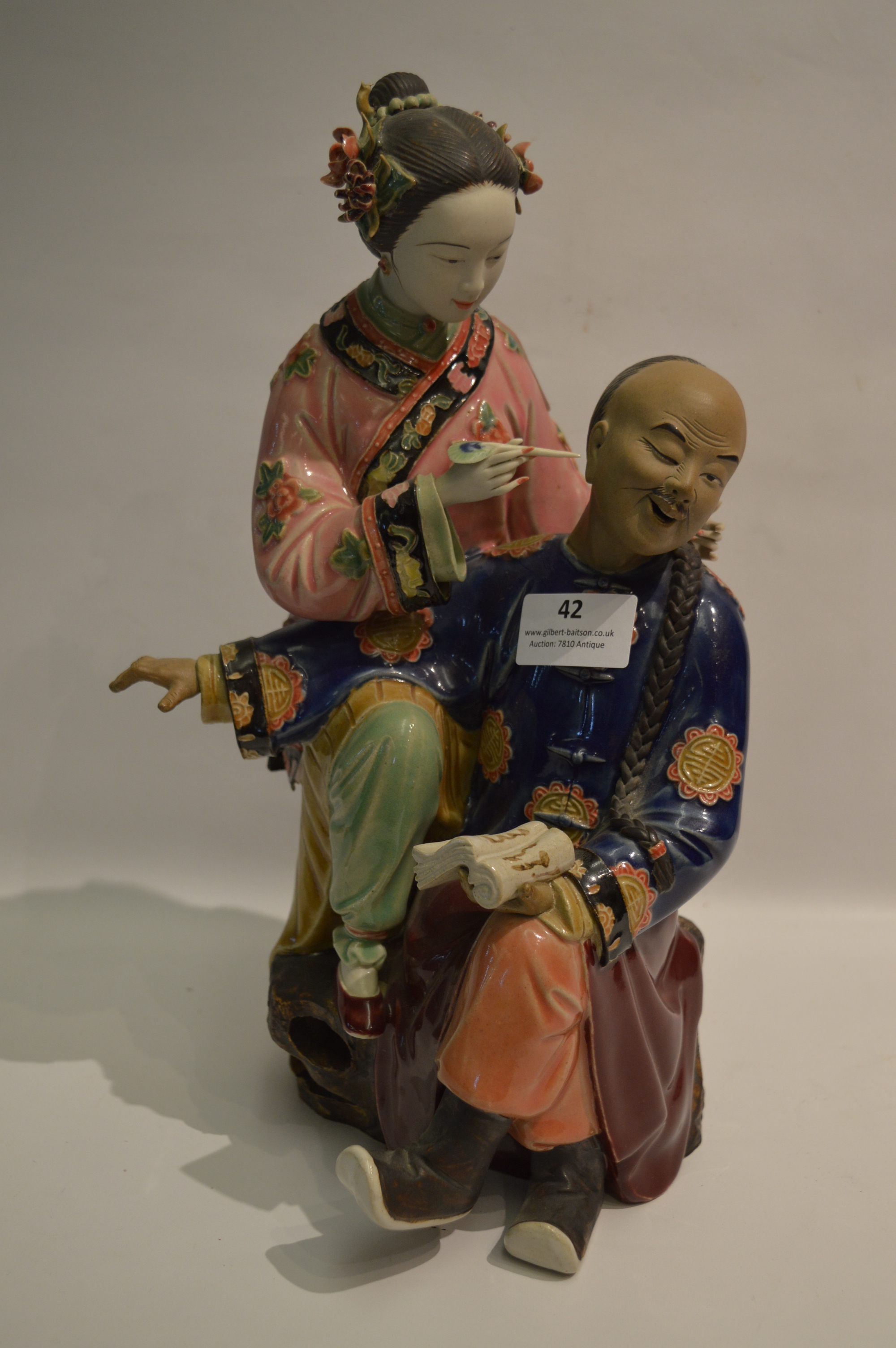 Chinese Pottery Figurine "Ear Waxing"