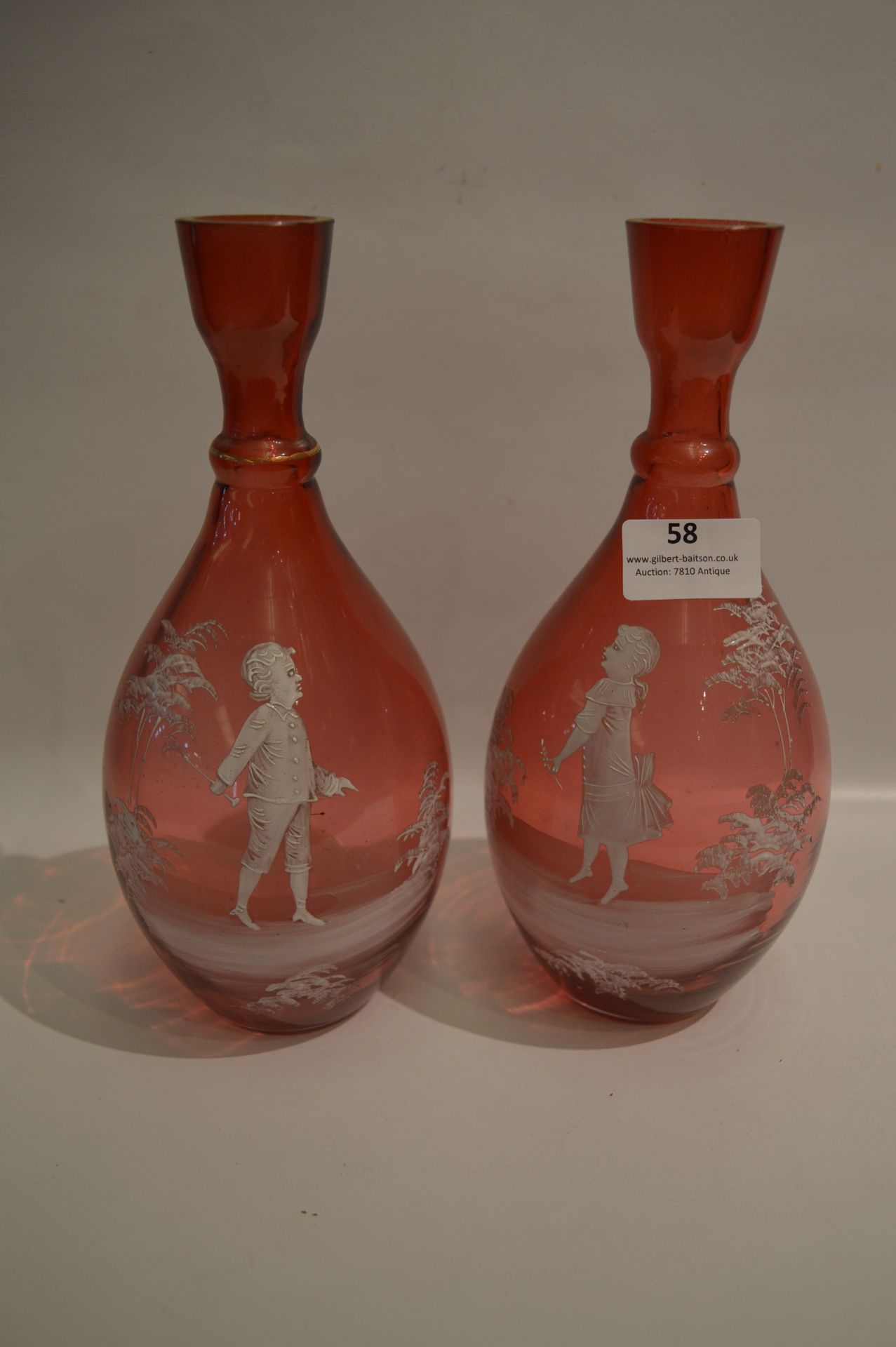 Pair of Ruby Glass Mary Gregory Vases