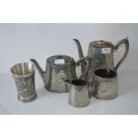 Britannian Metal Four Piece Tea Set and a Pewter Beaker