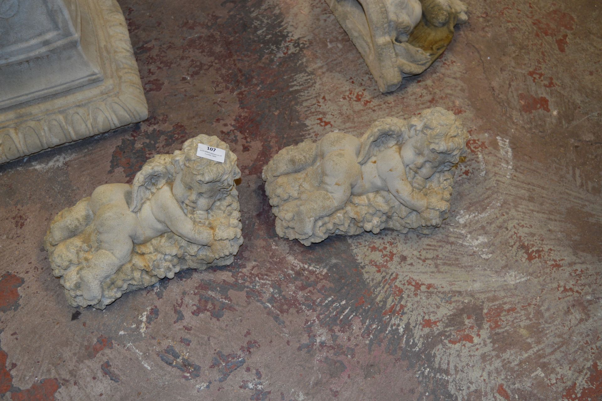 Pair of Simulated Sandstone Cherubs