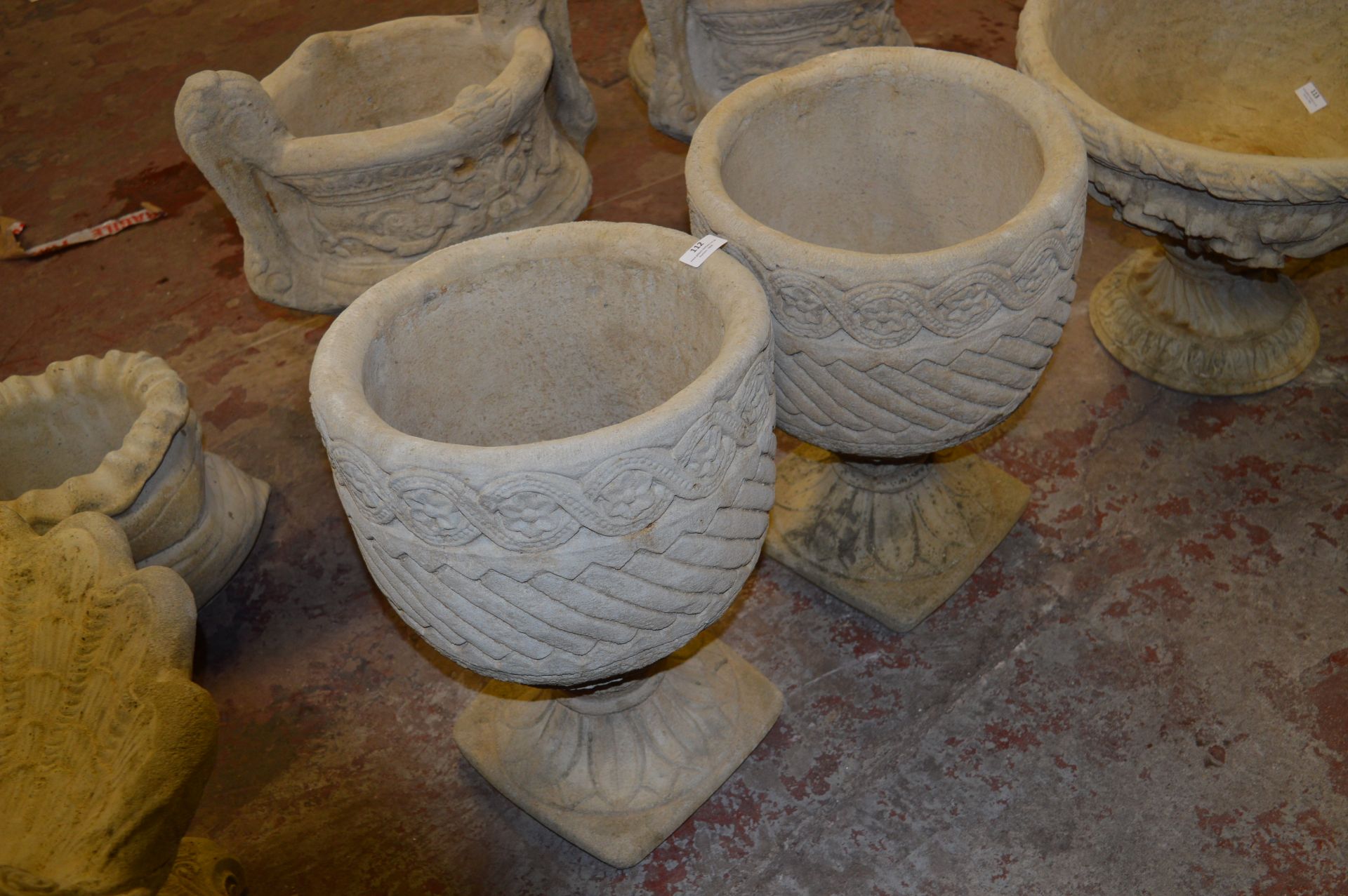 Pair of Decorative Planters on Plinths