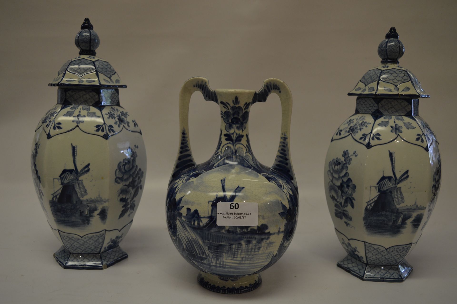 Pair of Delft Blue and White Lidded Vases and a Twin Handled Vase