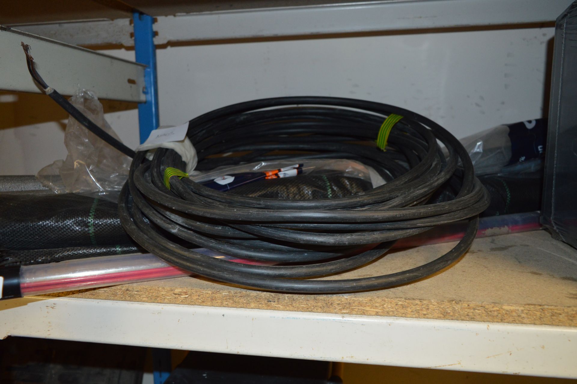 Roll of Armoured Cable, Weed Membrane and Pull Rods