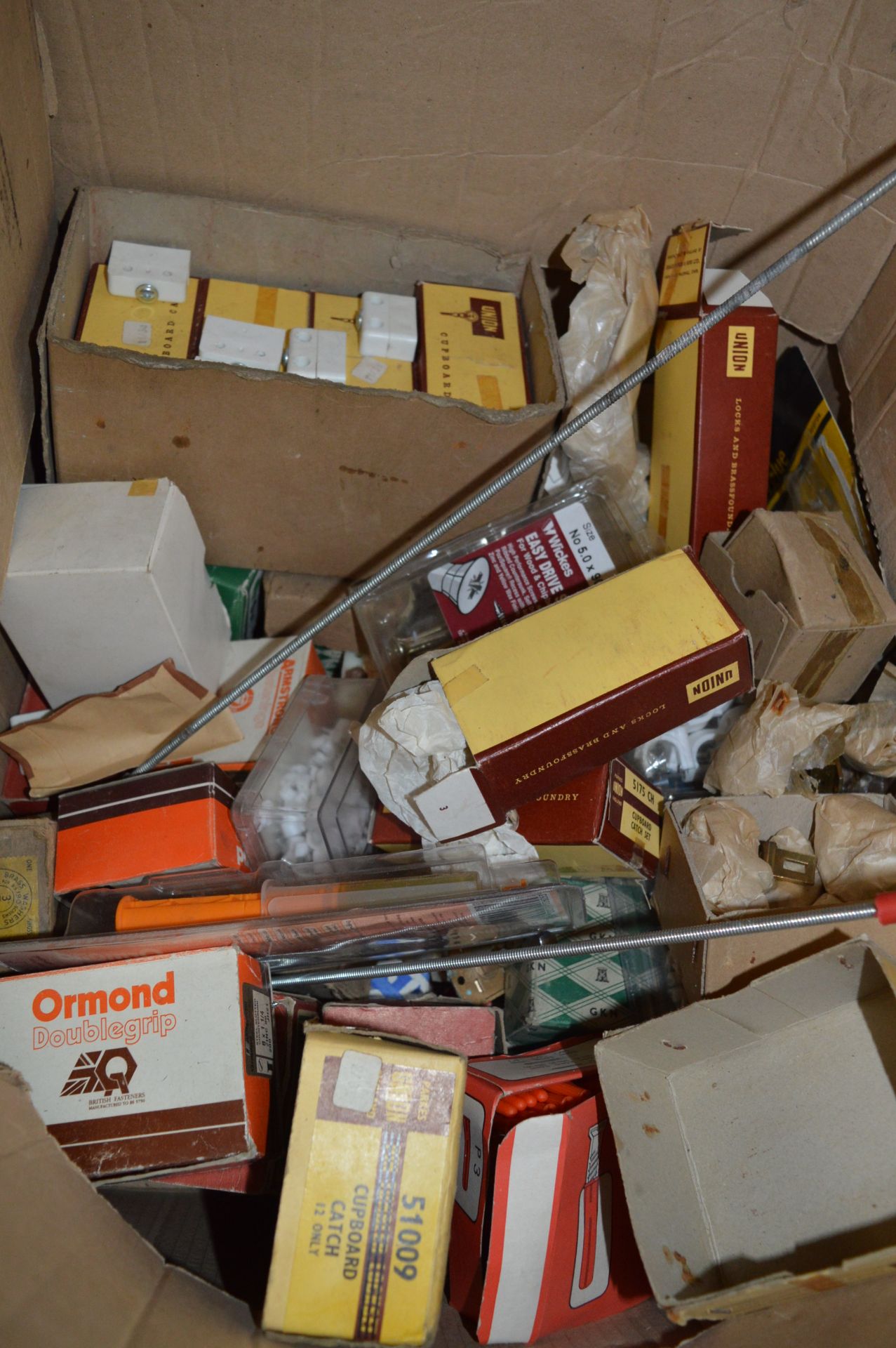 Box Containing Assorted Ironmongery Fixings Cable Clips, Conti Blocks, etc.