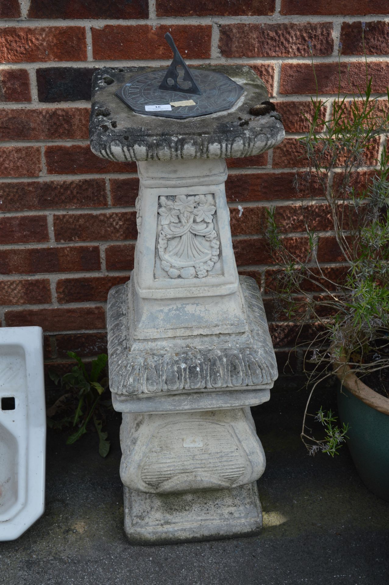 Brass Sundial on Concrete Column