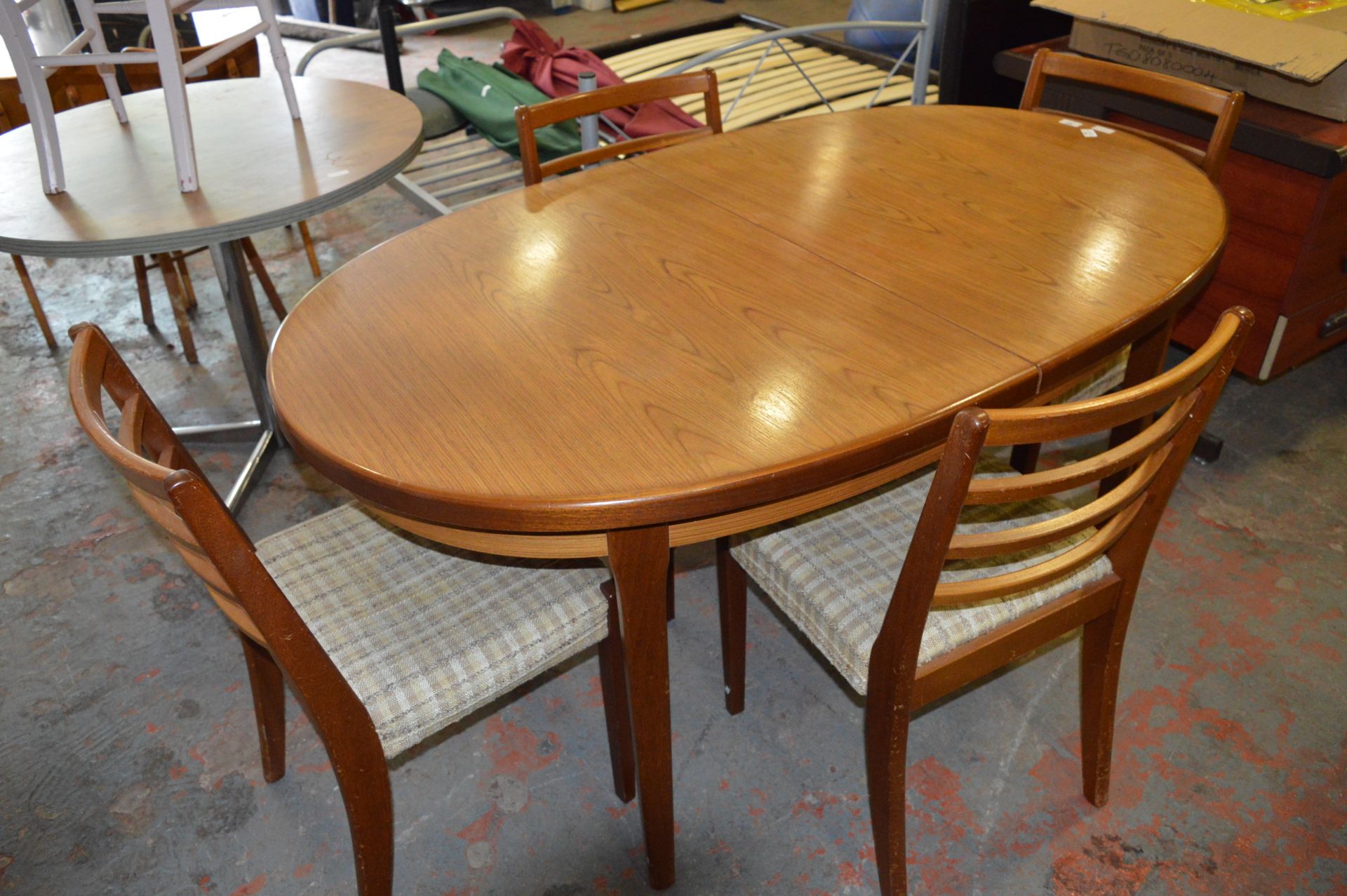 Teak Oval Topped Extending Dining Table and Four Chairs