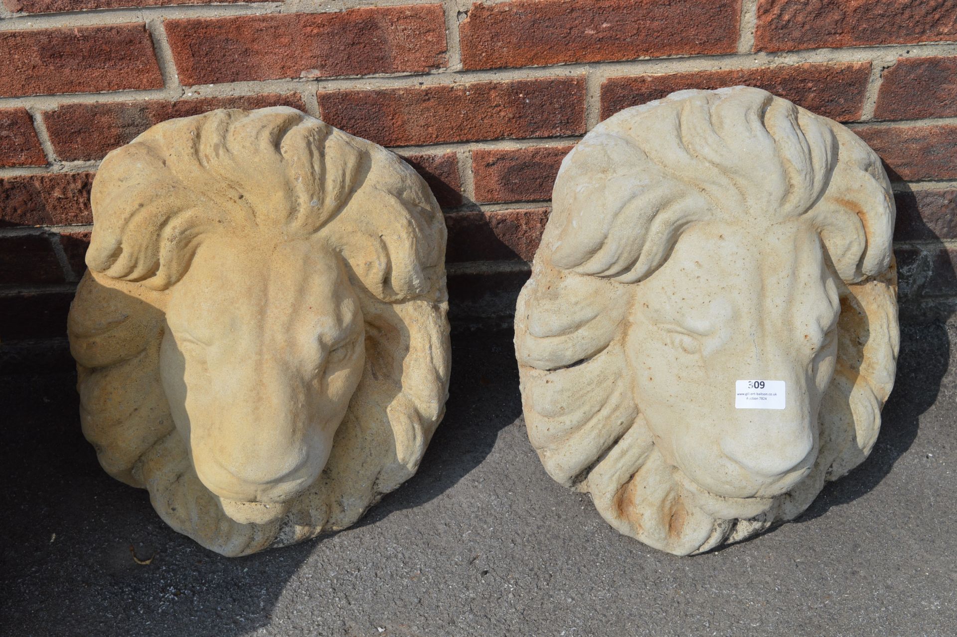 Pair of Reconstituted Limestone Lion Wall Masks