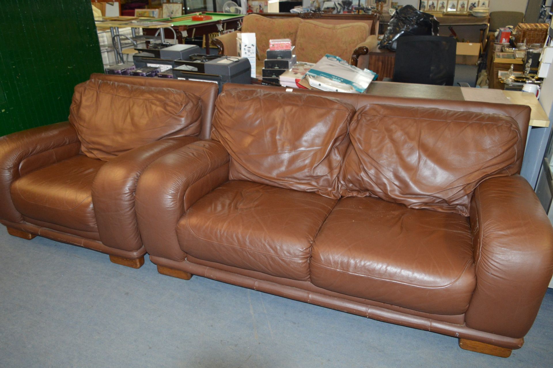 Brown Leatherette Suite; Two Seater And an Arm Chair