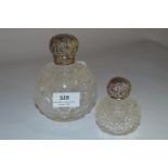 Pair of Embossed Silver Topped Perfume Bottles