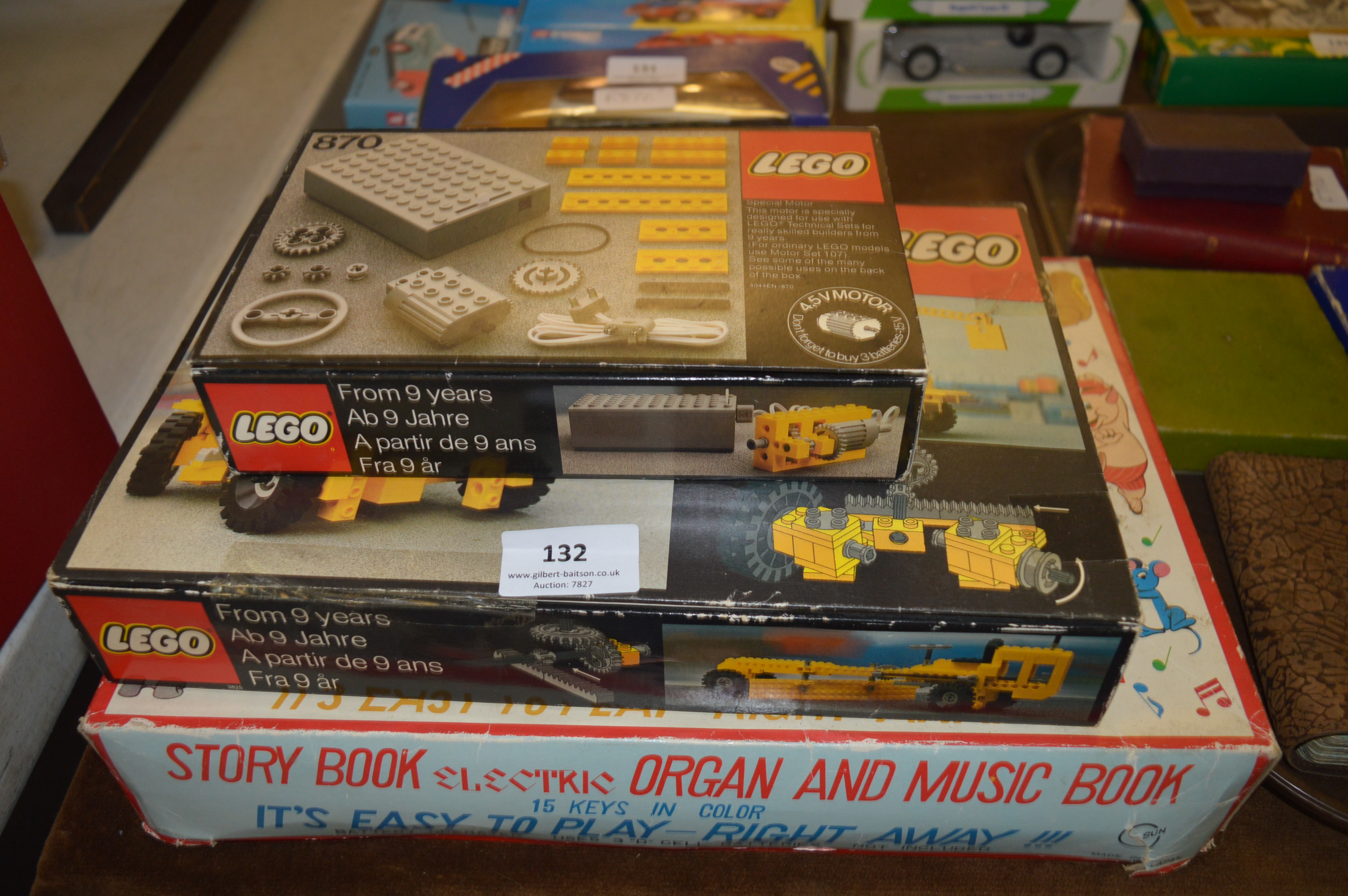 Two Boxed Lego Building Sets and a Toy Organ